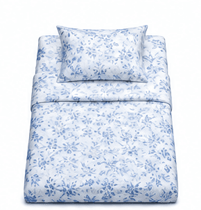 Crisp white bedsheets stacked after household laundry